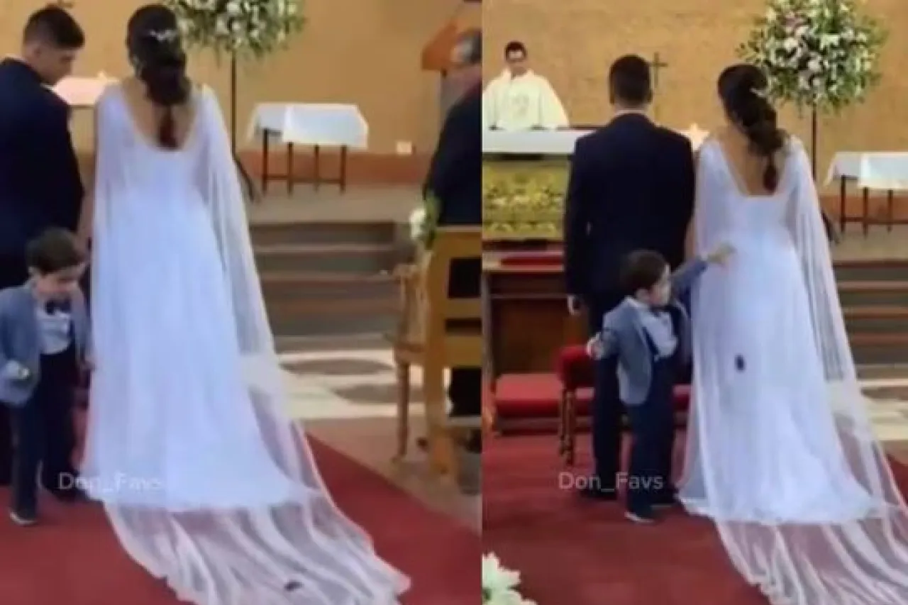 Niño utiliza el vestido de la novia como rampa para sus carritos