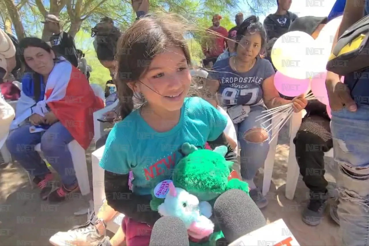 Llevan alegría a niños migrantes en el río Bravo