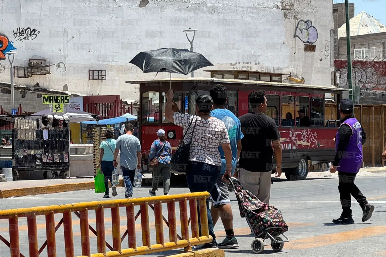Sombrillas, gorros y aguas frescas: así enfrenta Juárez el calor