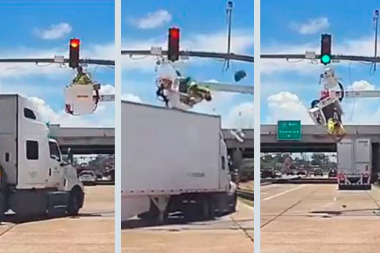 Video: Tráiler choca grúa en Louisiana; trabajador queda colgando