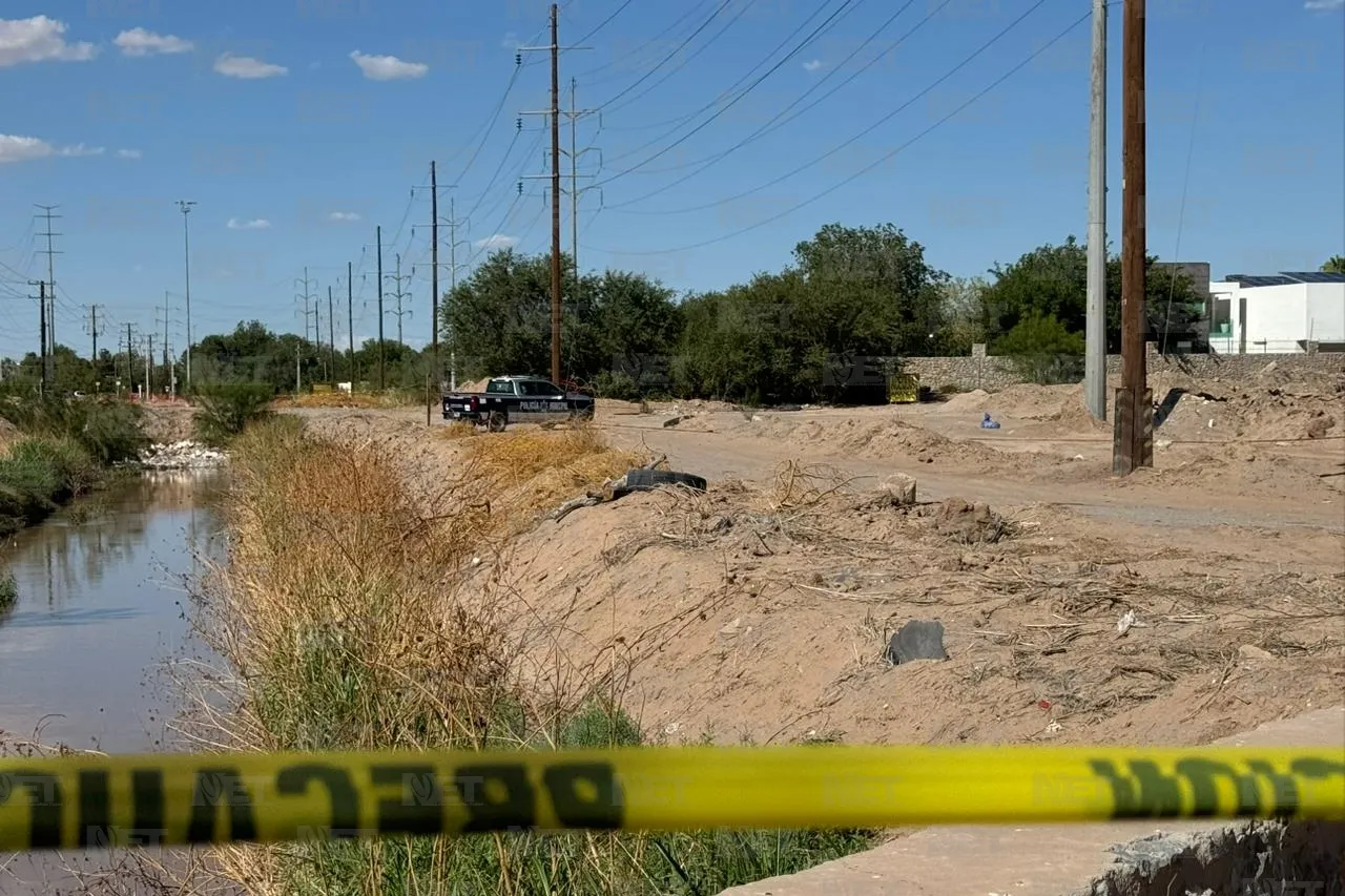 Abandonan cuerpo cerca de acequia en Campos Elíseos