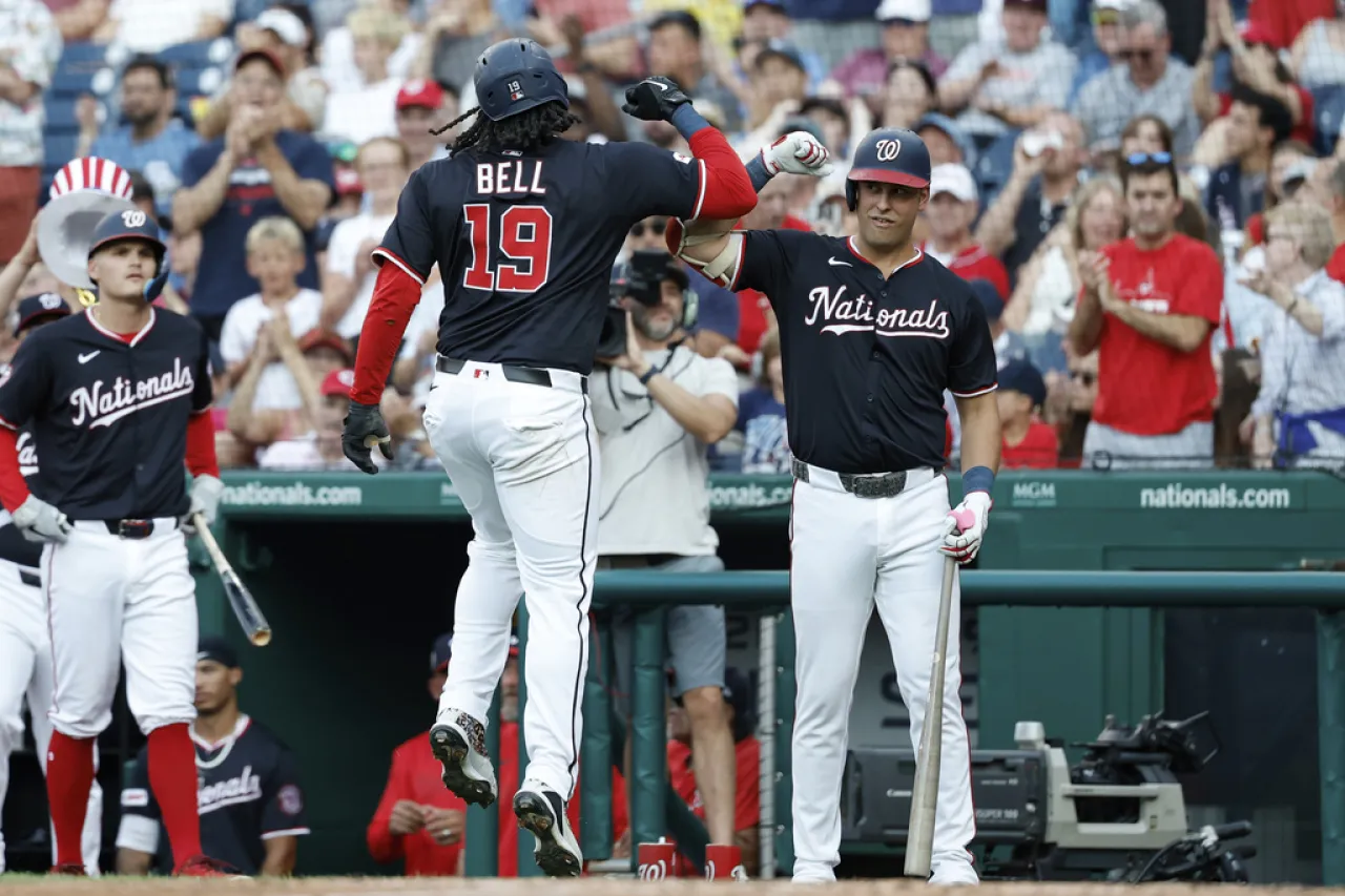 Bell y Lile lideran a Nacionales en victoria sobre Rojos